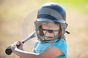 Kid baseball ready to bat. Child batter about to hit a pitch during a baseball game.