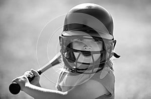 Kid baseball ready to bat. Child batter about to hit a pitch during a baseball game.