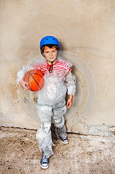 Kid and basketball ball overprotecting bubble wrap