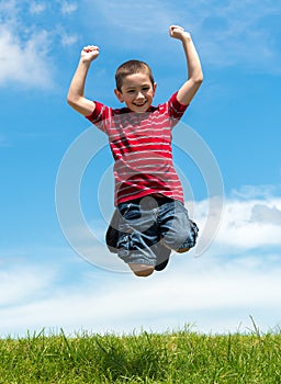 Kid big jump in park