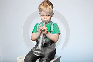 Kid Blowing Trumpet