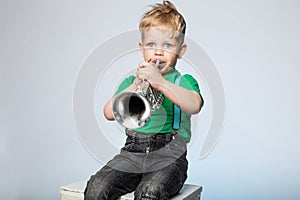 Kid Blowing Trumpet