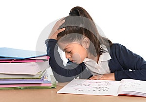 Kid bored under stress with a tired face expression in hate homework concept