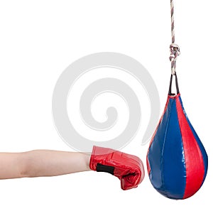 Kid with boxing glove punches punching bag