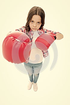 Kid boxing gloves isolated white. Child boxer defend herself. Sport activity. Boxing practice. Feminist movement. Self