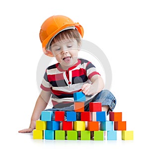 Kid boy as a construction worker in protective