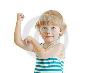 Kid boy child strength training and showing muscles.