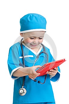 Kid boy doctor with tablet pc in hands