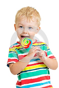 Kid boy eating lollipop isolated