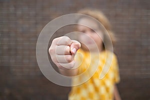 Kid boy temper with angry expression. Angry hateful little anger boy, child furious. Angry rage kids face close up