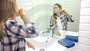 Kid Brushing Baby Teeth in Bathroom, Child Washing by Toothbrush, Girl in Mirror