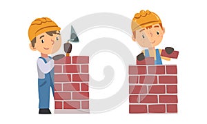 Kid builders working with construction tools set. Boys in overalls and safety hard hat building house wall with bricks