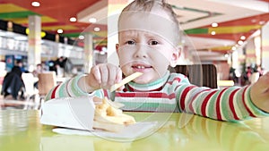 The kid in the cafe refuses to eat french fries