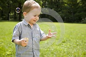 Kid Catches Soap Bubbles