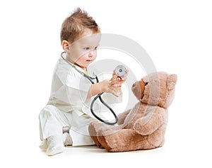 Kid or child playing doctor with stethoscope