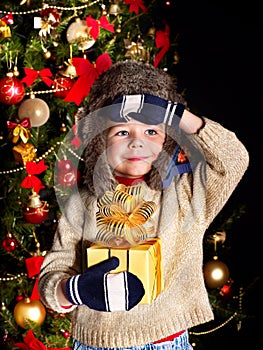 Kid with Christmas gift box.