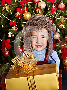 Kid with Christmas gift box.