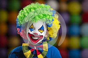 Kid in clown makeup