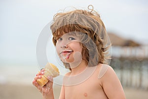 Kid with dirty face eating icecream. Kids ice cream.