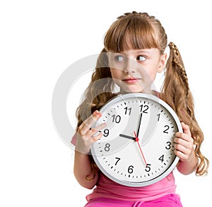 Kid displaying nine o'clock time in studio photo