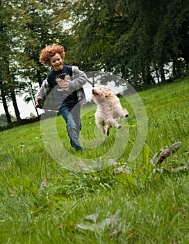 Kid and Dog running