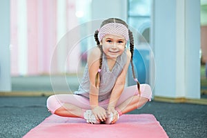 Kid doing fitness exercises