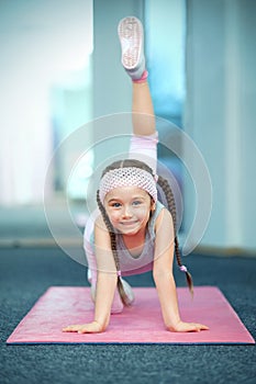 Kid doing fitness exercises