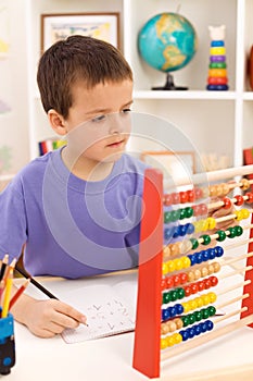 Kid doing math exercise