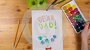 Kid draw greeting card for fathers day, stop motion animation