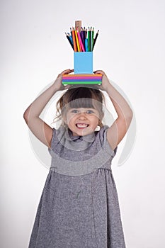 Kid with draw and paint supplies. Kids happy to go back to school. Creative children over white background.