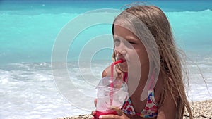 Kid Drinking Ice Juice on Beach, Child Playing on Seashore, Thirsty Young Girl Portrait View on Coastline in Summer Vacation