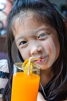 Kid Drinking Orange Juice