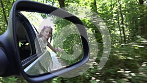 Kid Driving by Car, Child Playing outside the Window, View Little Girl in Mirror