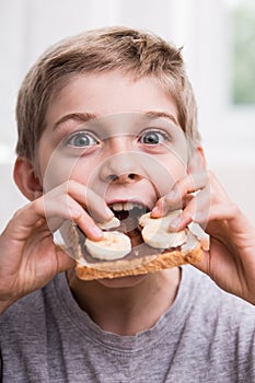 Kid eating with appetite