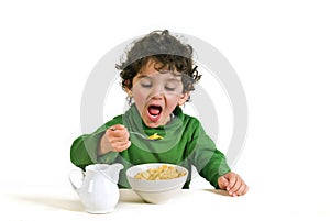 Kid eating cornflakes