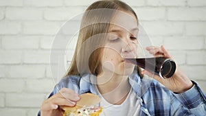 Kid Eating Fast Food, Child Eats Hamburger in Restaurant, Hungry Teenager Blonde Girl with Cheeseburger