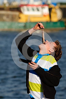 Kid eating herring