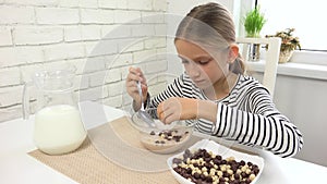 Kid Eating Milk and Cereals at Breakfast, Child in Kitchen, Teenager Girl Tasting Healthy Food at Meal, Nutrition
