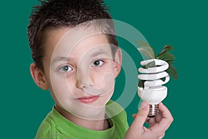 Kid with energy saving bulb