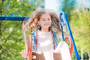 Kid enjoying ride in the park