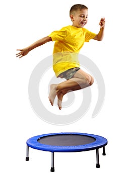 Kid exercising and jumping on a trampoline