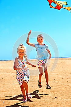 Kid flying kite outdoor.