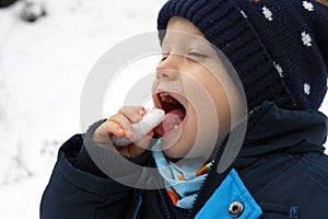 Kid fooling around in the snow
