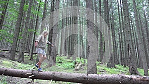 Kid in Forest Walking on Tree Log, Child Playing Hiking in Park, Tourist Adventure Girl in Camping in Mountains, Camp Excursion