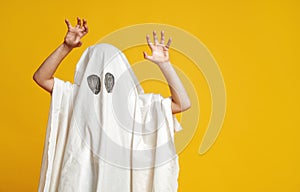 Kid in ghost costume