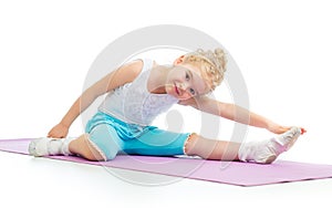 Kid girl doing fitness exercises