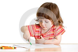 Kid girl drawing with colour crayons