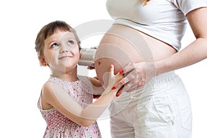 Kid girl listening with can pregnant pregnant mother