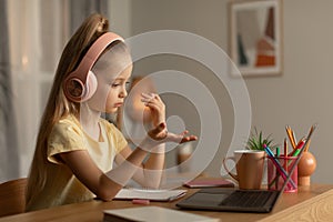 Kid Girl Making Video Call On Laptop Learning At Home
