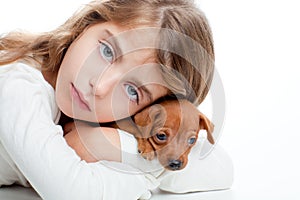 Kid girl with mini pinscher pet mascot dog